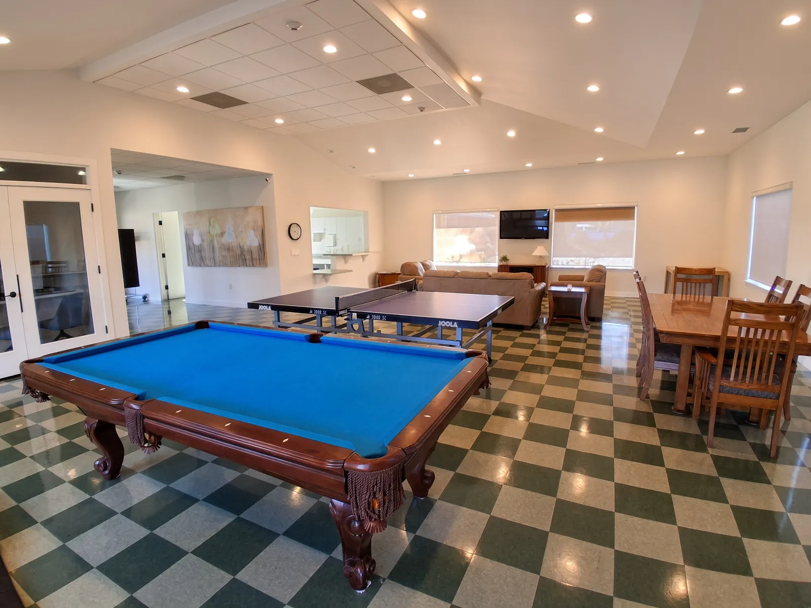 Clubhouse game room with pool table